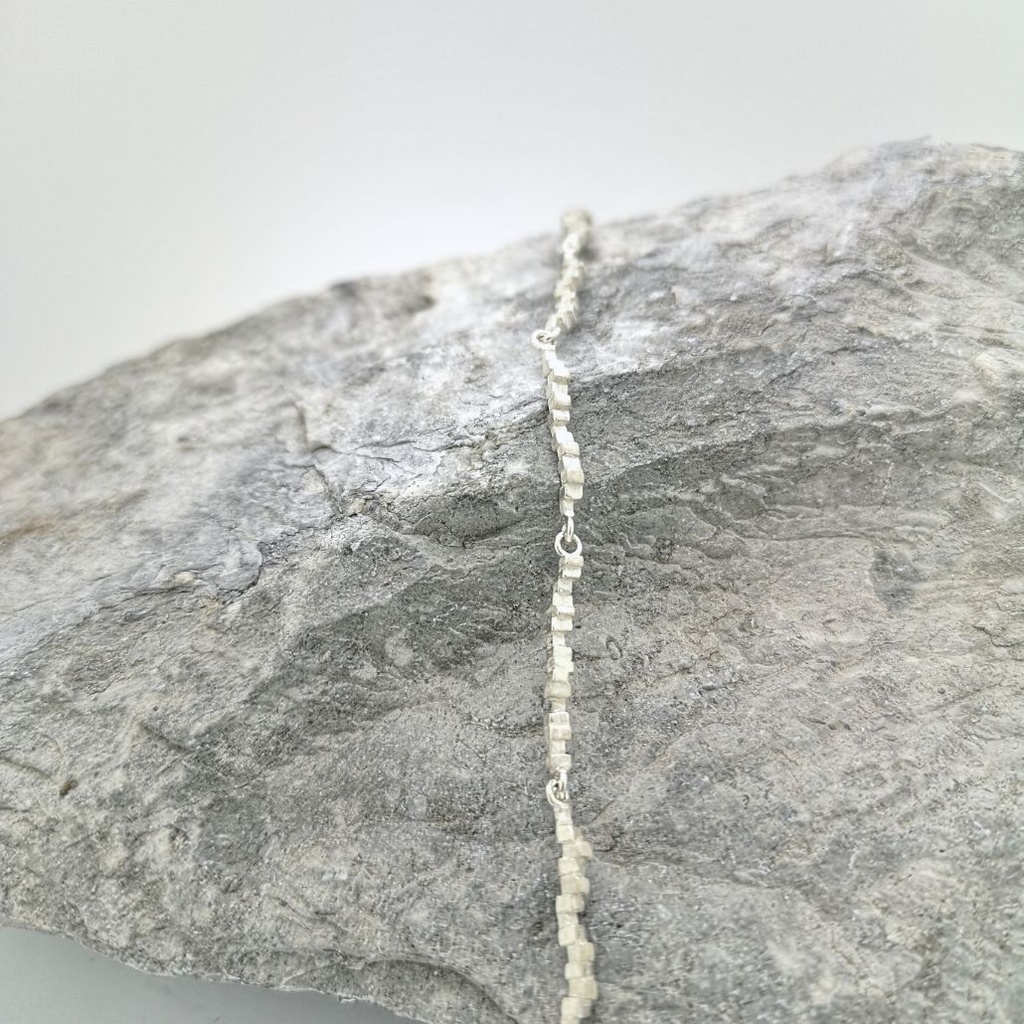 Ronduit - Gelede strook armband